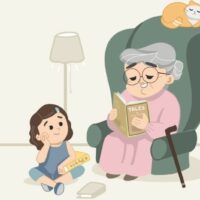 Oma erzählt der süßen Enkelin Geschichten und liest Geschichten vor, während die Katze auf der Couch schläft.
